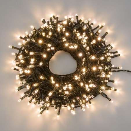 Tira 100 LED cálida enlazable 6,5 mts luz fija cable verde