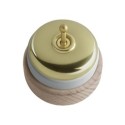 Conmutador porcelana base madera natural y tapa dorada