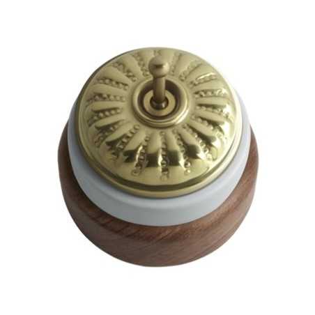 Conmutador porcelana base madera oscura tapa grabada oro