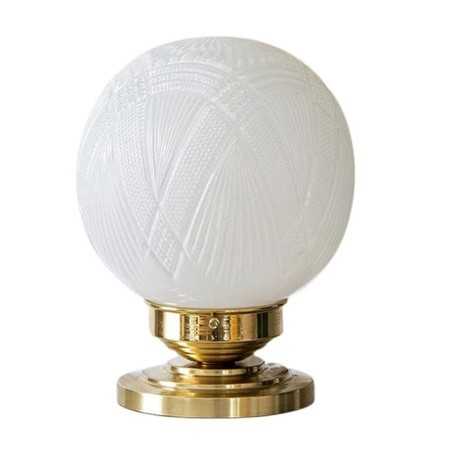Lámpara de mesa en latón con globo de cristal